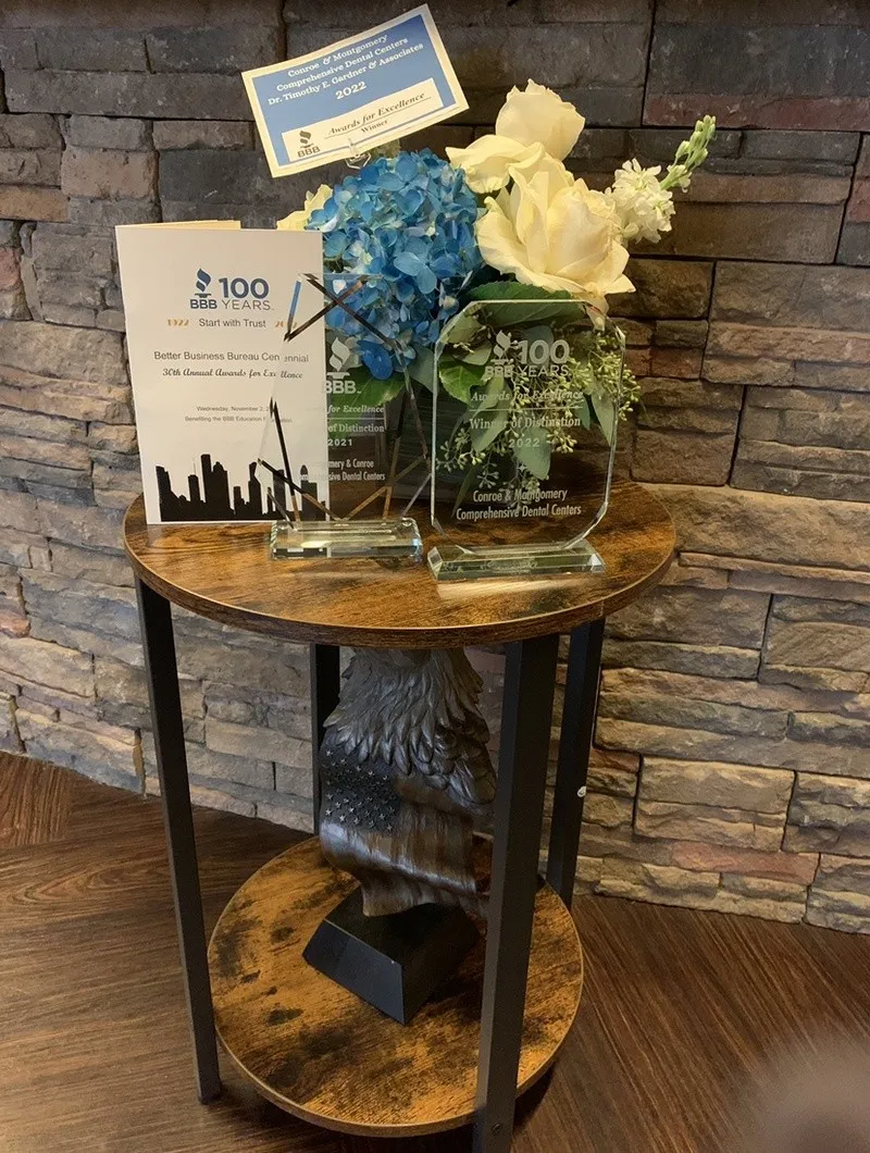 End table with Dental awards